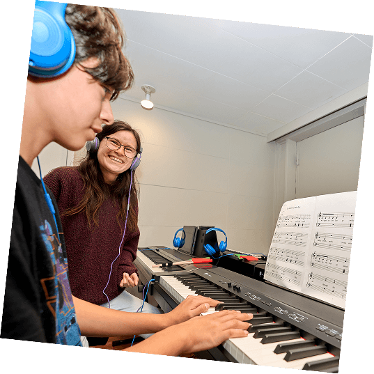A local Pasadena student discovering the joy of playing their favorite songs.